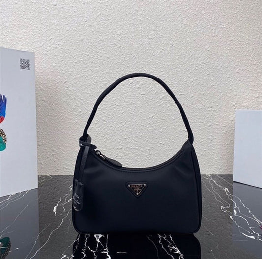 PRADA MINI BORSA IN RE-NYLON